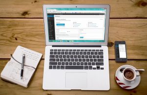 An illustration of a laptop with a CMS on the screen